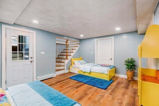 150 Gore Rd, Revere, MA 02151 - bedroom featuring baseboard heating, recessed lighting, and wood finished floors