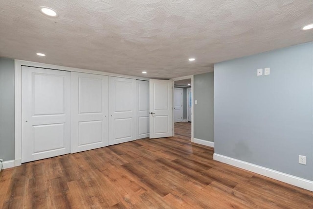 150 Gore Rd, Revere, MA 02151 - finished basement with wood finished floors and recessed lighting
