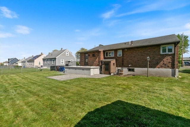 150 Gore Rd, Revere, MA 02151 - back of property featuring brick siding and a patio area
