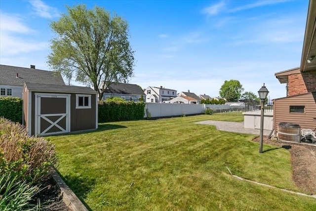 150 Gore Rd, Revere, MA 02151 - view of yard featuring a storage unit and a residential view