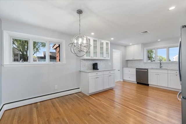 150 Gore Rd, Revere, MA 02151 - kitchen featuring stainless steel appliances, baseboard heating, backsplash, light wood-style flooring, and recessed lighting