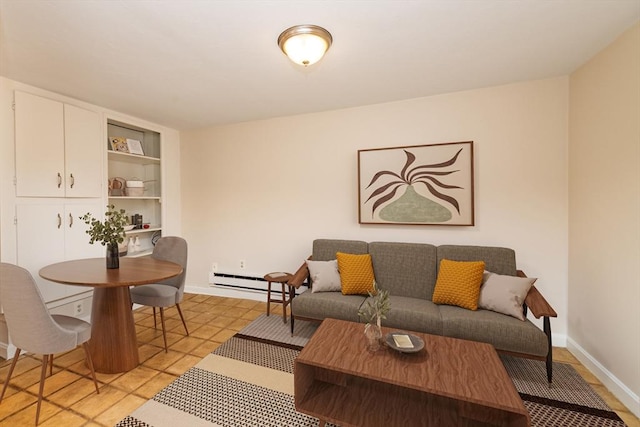 9 Hancock St Unit 1, Boston, MA 02114 - living room featuring a baseboard heating unit, baseboards, light tile patterned floors, and built in shelves