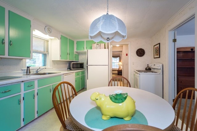 12 Bay State Rd, Natick, MA 01760 - kitchen featuring white appliances, a sink, light countertops, and crown molding
