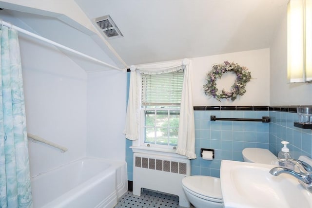 12 Bay State Rd, Natick, MA 01760 - bathroom with radiator heating unit, a sink, toilet, vaulted ceiling, and shower / tub combo with curtain