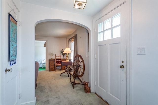 12 Bay State Rd, Natick, MA 01760 - entryway with arched walkways and light carpet