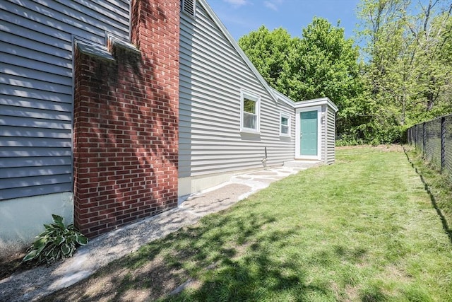 view of yard featuring entry steps