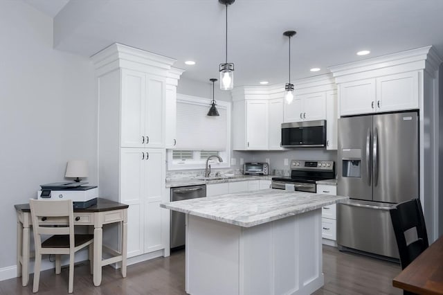10 Soucy Dr Unit 10, Rutland, MA 01543 - kitchen with stainless steel appliances, dark wood-style floors, white cabinets, a center island, and recessed lighting