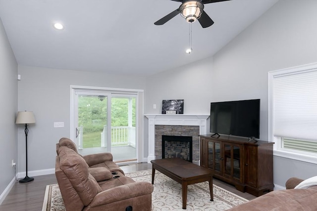 10 Soucy Dr Unit 10, Rutland, MA 01543 - living room featuring wood finished floors, ceiling fan, a stone fireplace, recessed lighting, and high vaulted ceiling