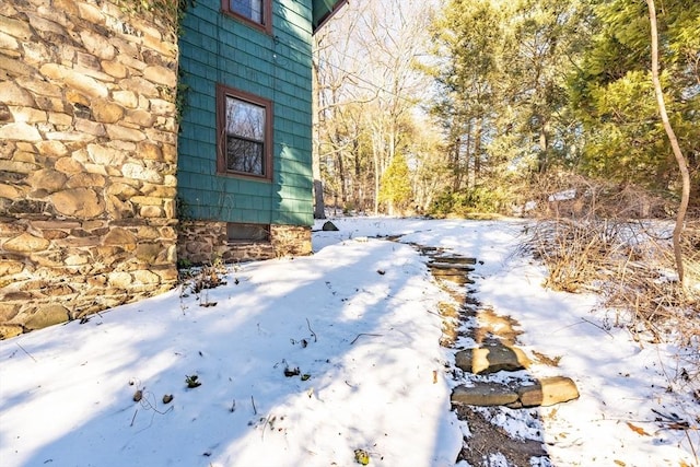 view of snow covered property