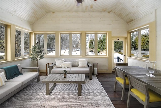 sunroom featuring ceiling fan, wood ceiling, and lofted ceiling