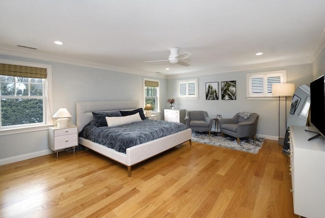 bedroom featuring visible vents, ornamental molding, recessed lighting, light wood finished floors, and baseboards