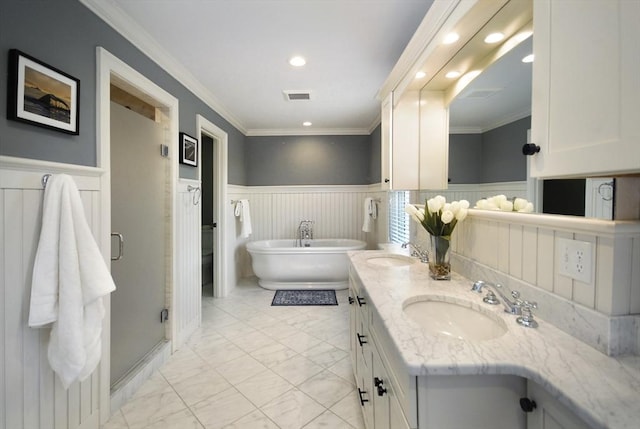 full bath featuring a sink, visible vents, marble finish floor, and a wainscoted wall