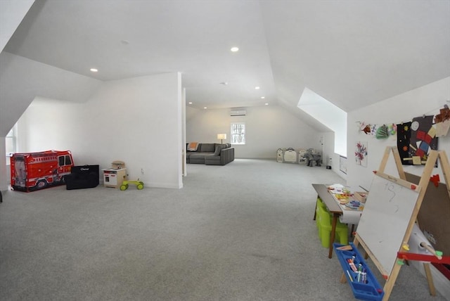 rec room featuring recessed lighting, lofted ceiling, and carpet flooring