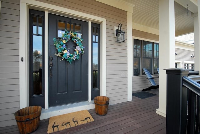 doorway to property with covered porch