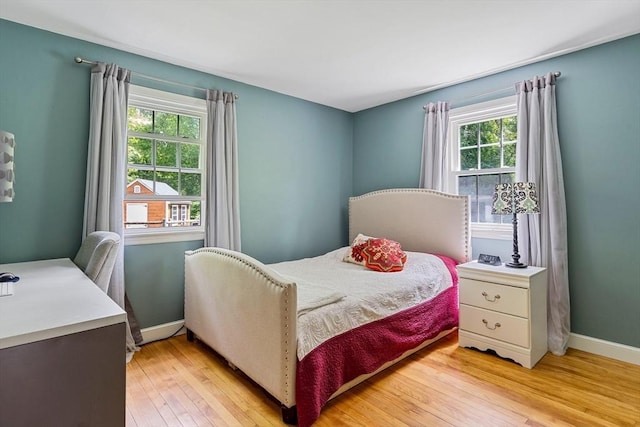 21 Boutwell, Andover, MA 01810 - bedroom with light wood finished floors and an office area