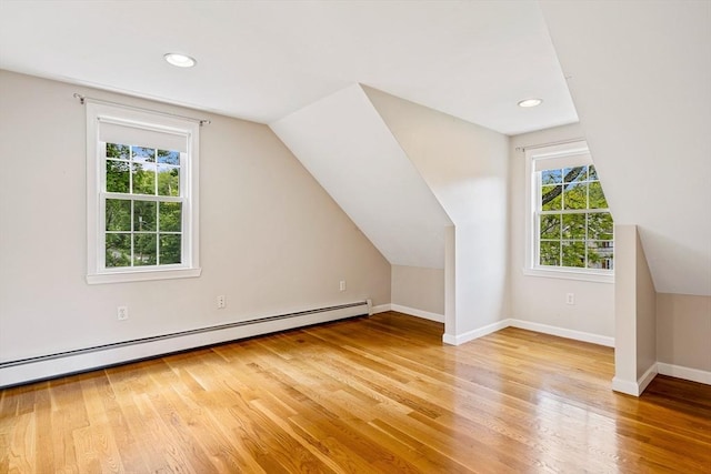 21 Boutwell, Andover, MA 01810 - bonus room featuring light wood-style flooring, a baseboard heating unit, vaulted ceiling, and recessed lighting