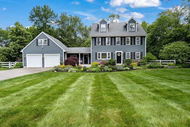 21 Boutwell, Andover, MA 01810 - colonial home featuring concrete driveway and a garage