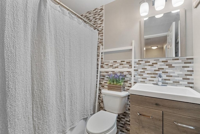 9 Adam St Unit 12, Easton, MA 02375 - bathroom with vanity, toilet, tile walls, and a shower with shower curtain
