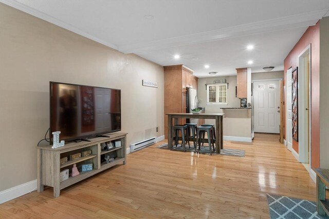 9 Adam St Unit 12, Easton, MA 02375 - living room featuring a baseboard heating unit, recessed lighting, light wood finished floors, baseboards, and ornamental molding