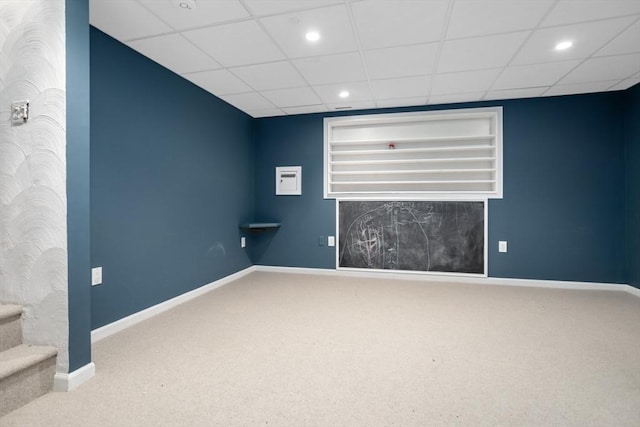 spare room with carpet, baseboards, and recessed lighting