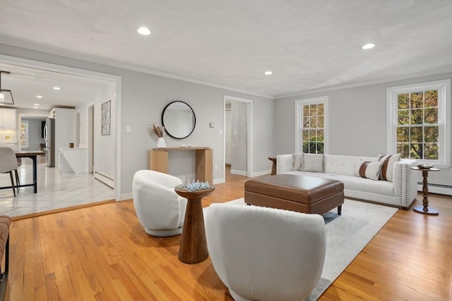 living area with baseboards, light wood-style floors, crown molding, and recessed lighting