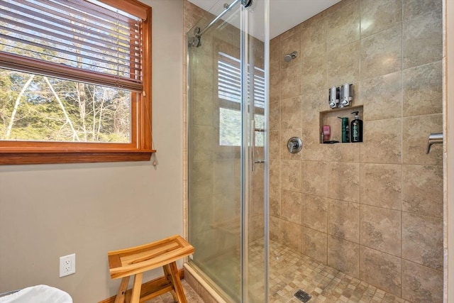 bathroom featuring a stall shower