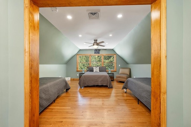 bedroom featuring visible vents, a ceiling fan, light wood-style flooring, vaulted ceiling, and recessed lighting