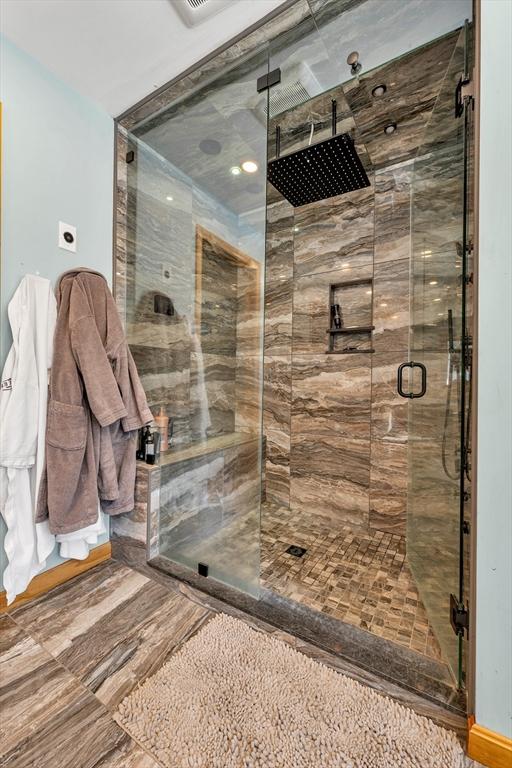 bathroom featuring a stall shower