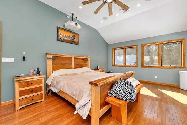 bedroom with light wood finished floors, baseboards, visible vents, vaulted ceiling, and recessed lighting