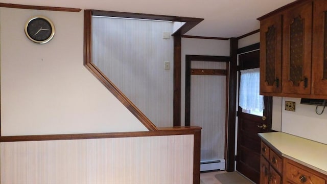 414 Cedar St, Dedham, MA 02026 - stairs with baseboard heating and crown molding