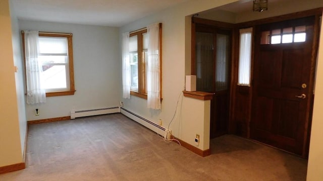 414 Cedar St, Dedham, MA 02026 - entrance foyer with carpet flooring and a baseboard radiator