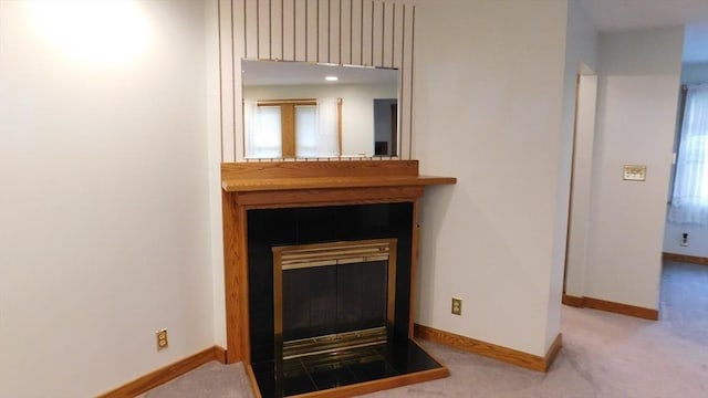 414 Cedar St, Dedham, MA 02026 - detailed view of a glass covered fireplace and carpet flooring