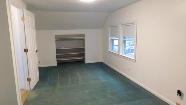 414 Cedar St, Dedham, MA 02026 - walk in closet with lofted ceiling and dark carpet