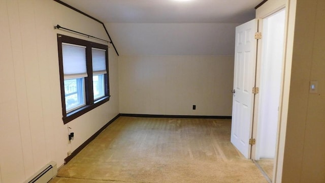 414 Cedar St, Dedham, MA 02026 - bonus room with a baseboard heating unit, light carpet, and lofted ceiling