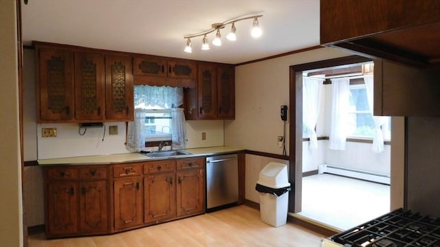 414 Cedar St, Dedham, MA 02026 - kitchen featuring a baseboard radiator, stainless steel dishwasher, plenty of natural light, and light countertops