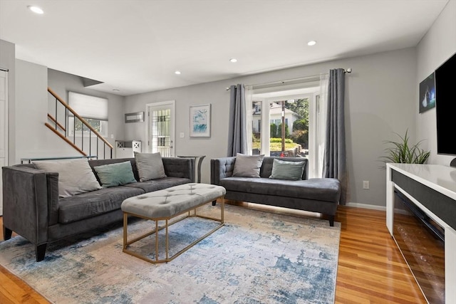 159 Glenellen Rd, Boston, MA 02132 - living area featuring wood finished floors, healthy amount of natural light, stairway, and recessed lighting