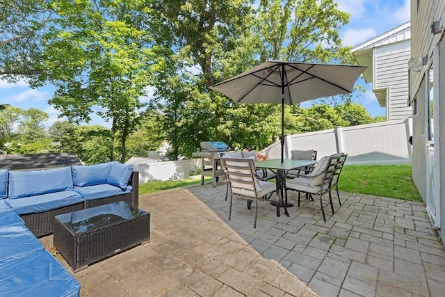 159 Glenellen Rd, Boston, MA 02132 - fenced backyard featuring an outdoor hangout area, a patio area, outdoor dining area, and a grill