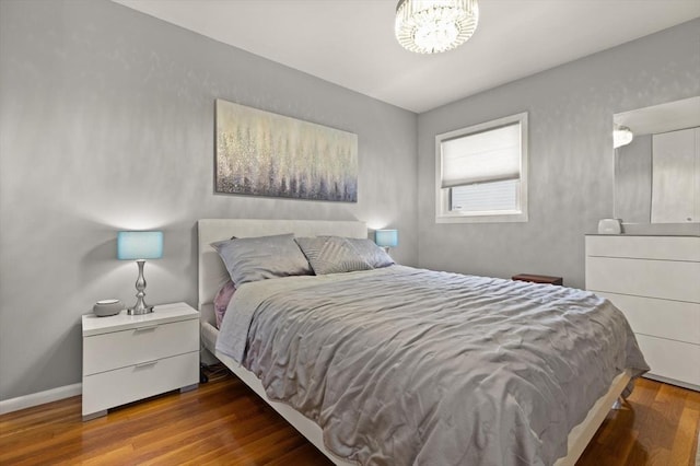159 Glenellen Rd, Boston, MA 02132 - bedroom with a chandelier and wood finished floors
