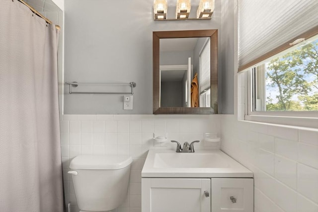 159 Glenellen Rd, Boston, MA 02132 - bathroom with tile walls, vanity, and a shower with shower curtain