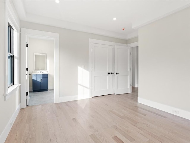 108 Glen St, Natick, MA 01760 - unfurnished bedroom featuring light wood-style floors, recessed lighting, baseboards, a closet, and ensuite bath