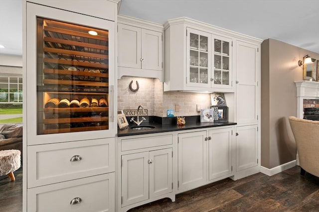 46 Baldpate Rd, Boxford, MA 01921 - bar with backsplash, dark wood-style floors, and recessed lighting