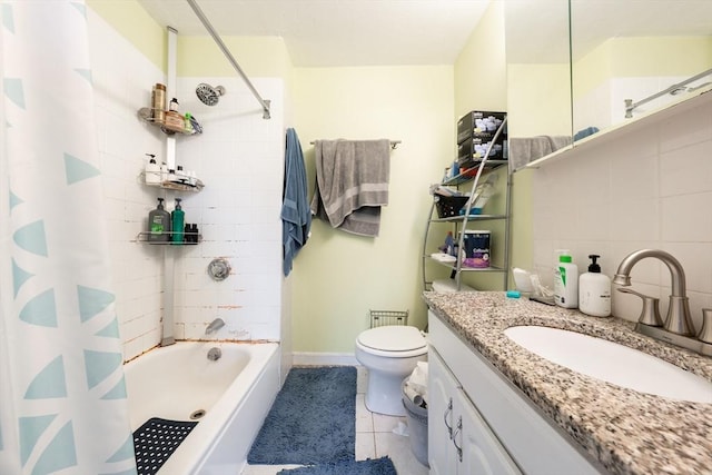 309 Elm St Unit 3, Cambridge, MA 02139 - full bathroom with shower / tub combo, toilet, vanity, tile patterned flooring, and baseboards