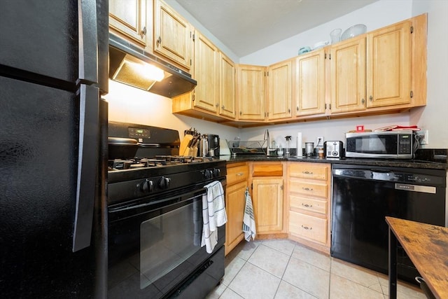 309 Elm St Unit 3, Cambridge, MA 02139 - kitchen with black appliances, under cabinet range hood, dark countertops, and light tile patterned flooring