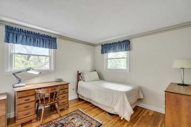 27 Philip Rd, Lexington, MA 02421 - bedroom with light wood-style flooring, baseboards, a desk, and crown molding