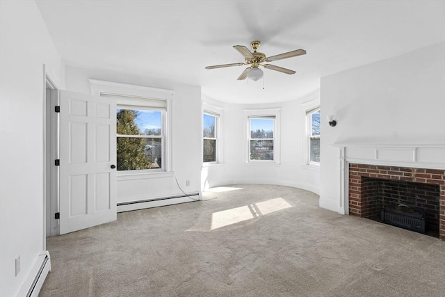 unfurnished living room featuring carpet floors, baseboard heating, and a fireplace