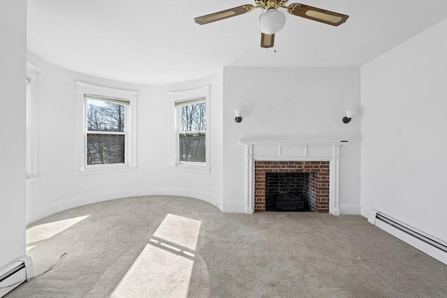 unfurnished living room featuring baseboards, baseboard heating, a fireplace, and carpet flooring