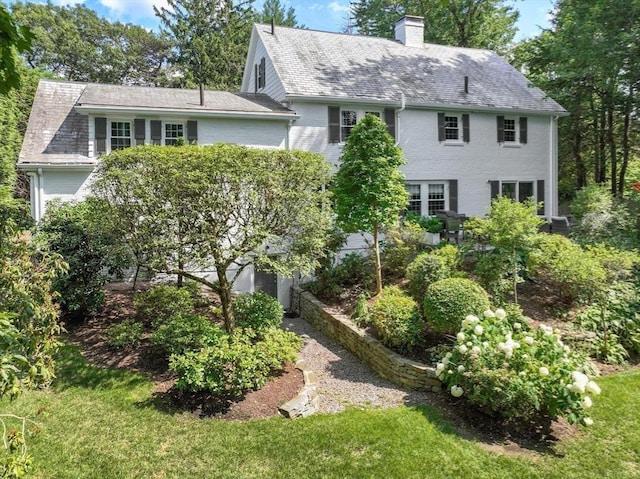 271 Greenwood St, Newton, MA 02459 - colonial-style house with a chimney