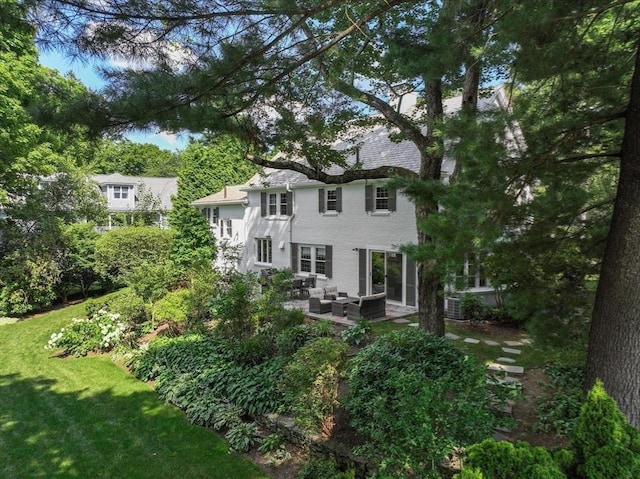 271 Greenwood St, Newton, MA 02459 - back of house with outdoor lounge area, a yard, and a patio area