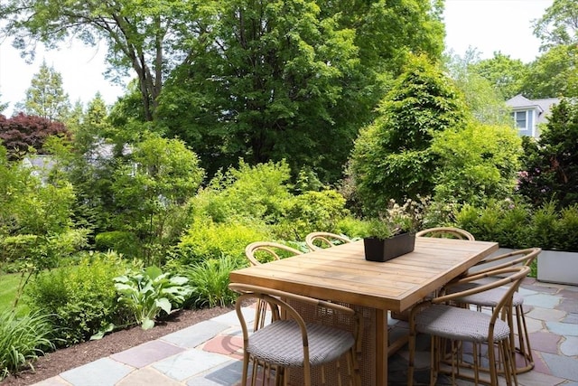 271 Greenwood St, Newton, MA 02459 - view of patio featuring outdoor dining space and view of wooded area