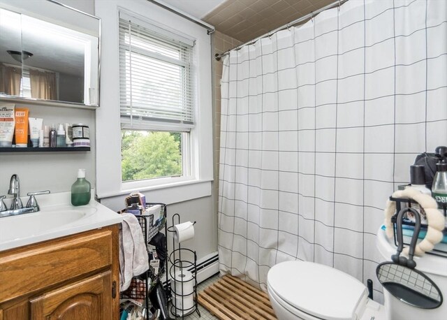 57 Prospect St, Watertown, MA 02472 - bathroom featuring toilet, vanity, plenty of natural light, and a shower with curtain